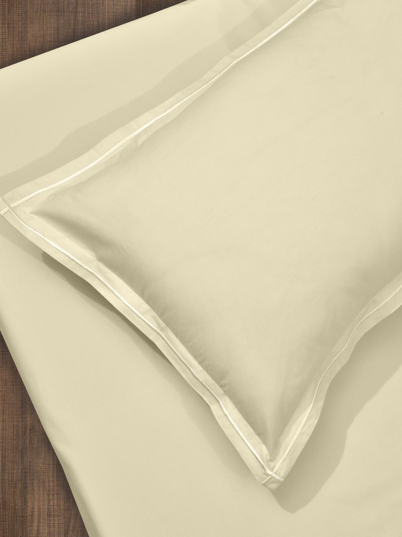 cream flat cotton percale bedsheet with embroidered pillowcase